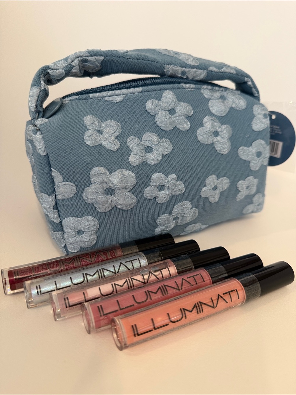 Blue Floral Cosmetic Pouch and FIVE Illuminati Lip Color